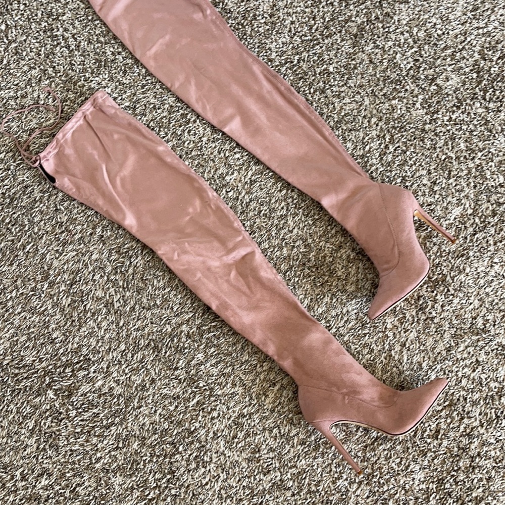 Thigh high pointy toe boots